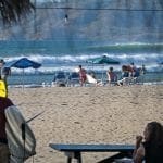 watching surfers on the beach tamarindo costa rica