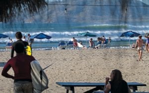 watching surfers on the beach tamarindo costa rica
