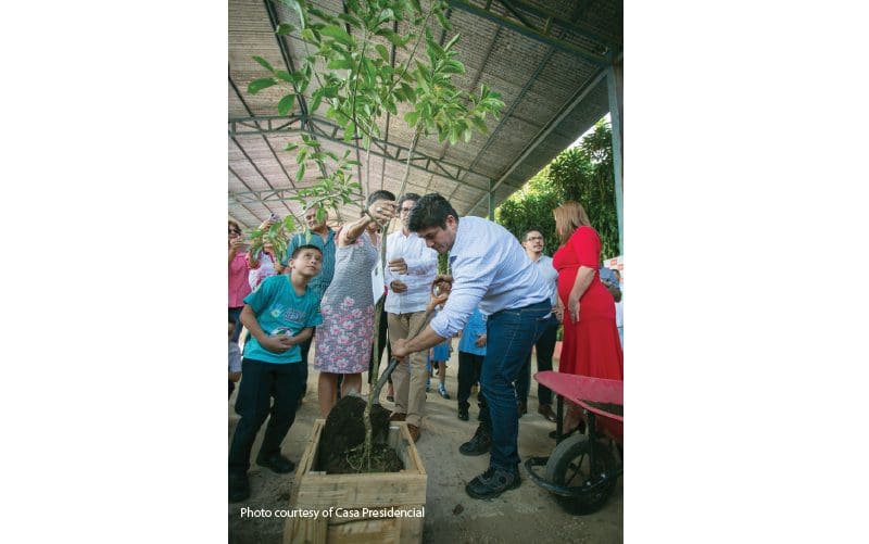 costa-rica-president-carlos-alvarado-quesada helping with 2019 earth day