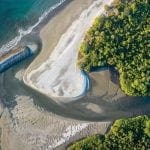 aerial view of playa cabuyal where the rivers meet the sea